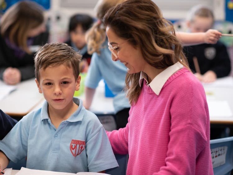 Teacher working with a student